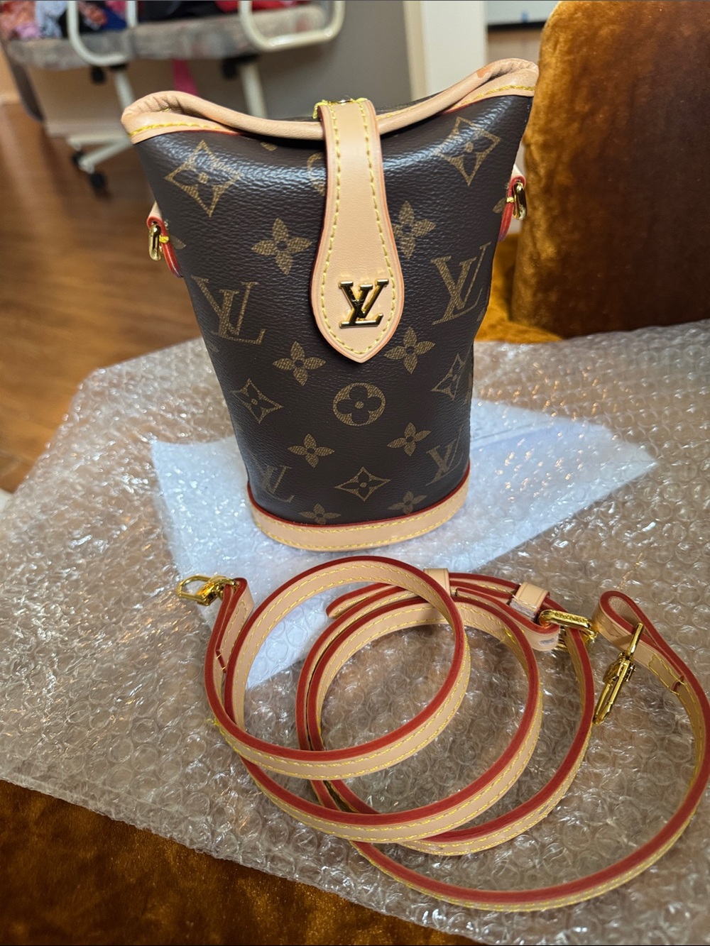 Louis Vuitton Monogram Mini Bucket Bag with Natural Trim and Red Edging